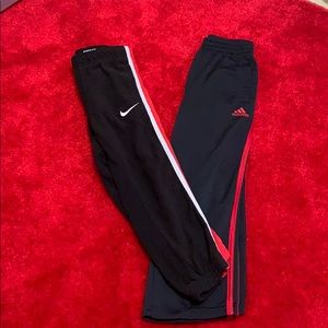 Nike & Adidas 2 pairs black and red pants.